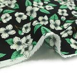 Popeline de coton imprimée pluie de fleurs fond noir