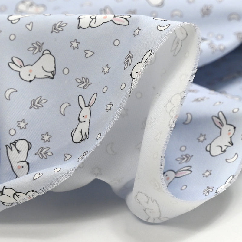 Cotton dive printed young rabbit light blue background