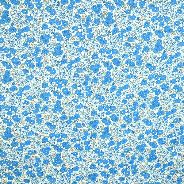 Popeline de coton imprimée champs de fleurs bleu