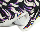 Jersey aspect maillot de bain imprimé cellule blanche et violette fond noir