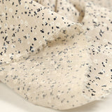Voile de coton imprimé et floqué fleurettes fond beige clair