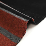 100% felted wool rust and gray stripe black background