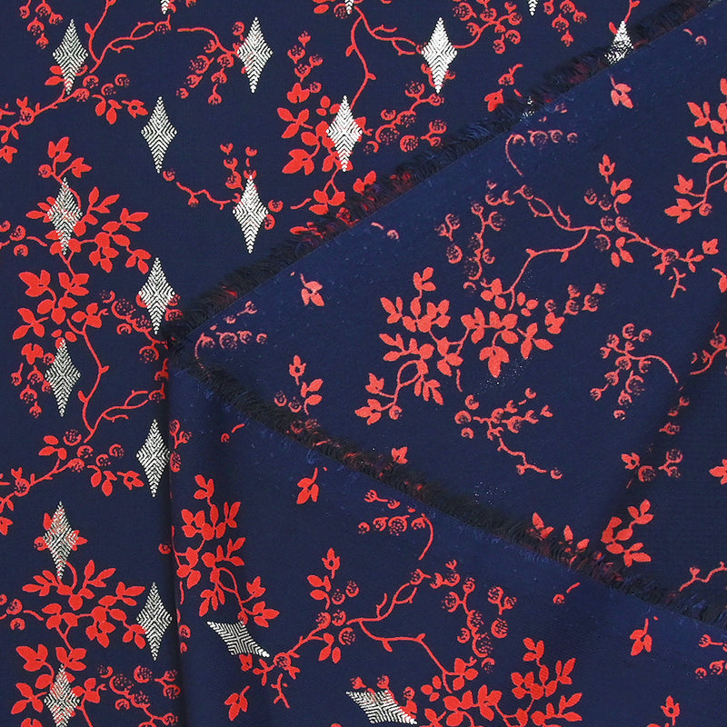 Microfibre imprimée polyester fleurs rouges et losanges argent fond marine