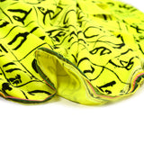 Velours de polyester ras imprimé lettres fond jaune fluo