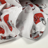 Fondo blanco de algodón estampado de ventilador rojo y negro