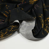 Jersey de polyester imprimé pointillisme fond noir