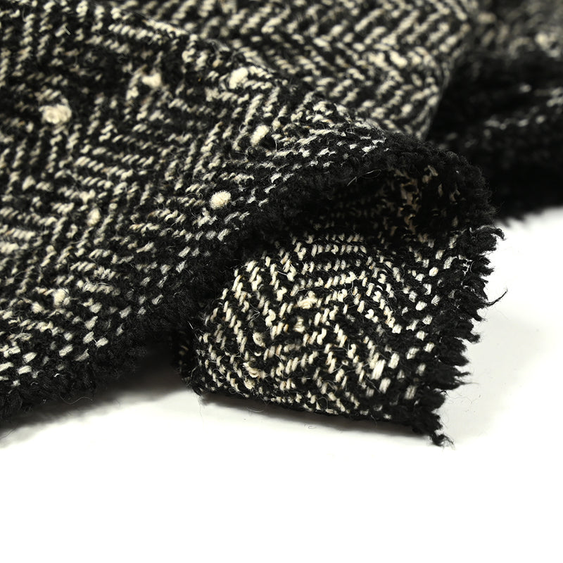 Laine mélangée chevrons noir et écru effet tweed