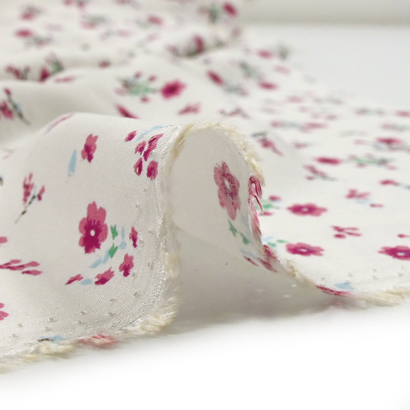 Viscose imprimée fleurettes roses fond blanc