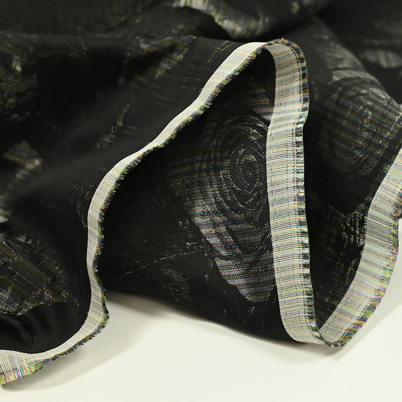 Toile tissée teinte fleurs noires et lignes multicolores brillantes