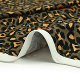 Viscose jersey printed leopard ocher khaki background