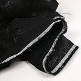 Jacquard satin lamé noir à pois effet gaufré rayé