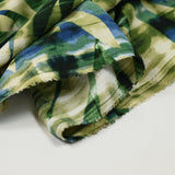 Polyester imprimé fougères fond vert et bleu