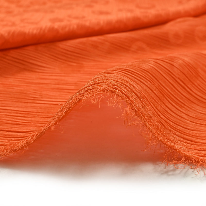 Mousseline polyester crinkle Elfy fond orange
