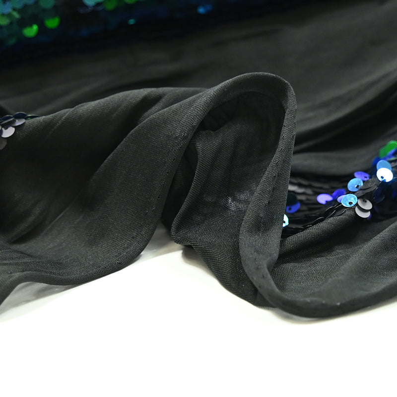 Maille sequin bleu changeant vert