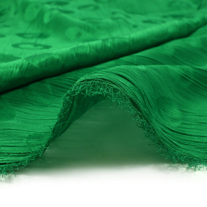 Mousseline polyester crinkle Elfy fond vert