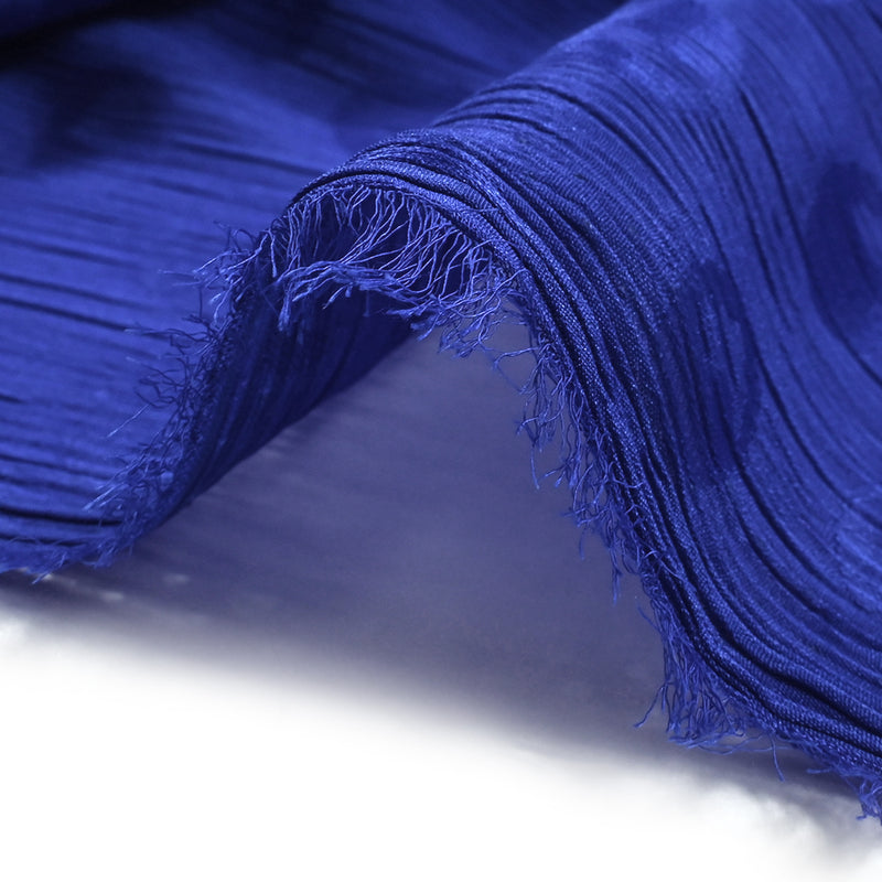 Mousseline Polyester Crinkle Elfy royal blue background