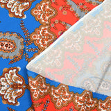 Crêpe satin polyester imprimé Florencia bleu et corail