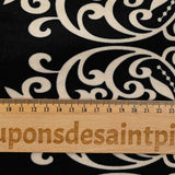 Short-cut velvet jersey with ornamental stripe and ivory polka dot print, black background