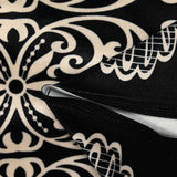 Short-cut velvet jersey with ornamental stripe and ivory polka dot print, black background