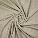 Jersey de polyester moucheté blanc fond grège