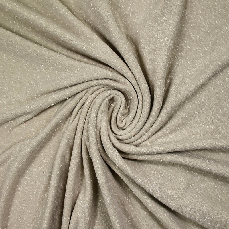 Jersey de polyester moucheté blanc fond grège