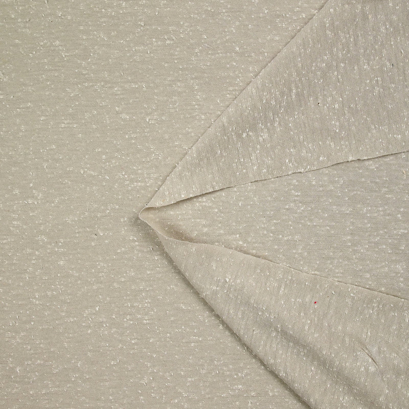 Jersey de polyester moucheté blanc fond grège