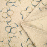 Lainage bouclette fantaisie fleurs fond beige