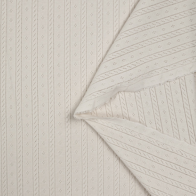 Jersey pointelle 100% coton blanc cassé