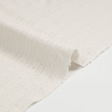 Jersey pointelle 100% coton blanc cassé