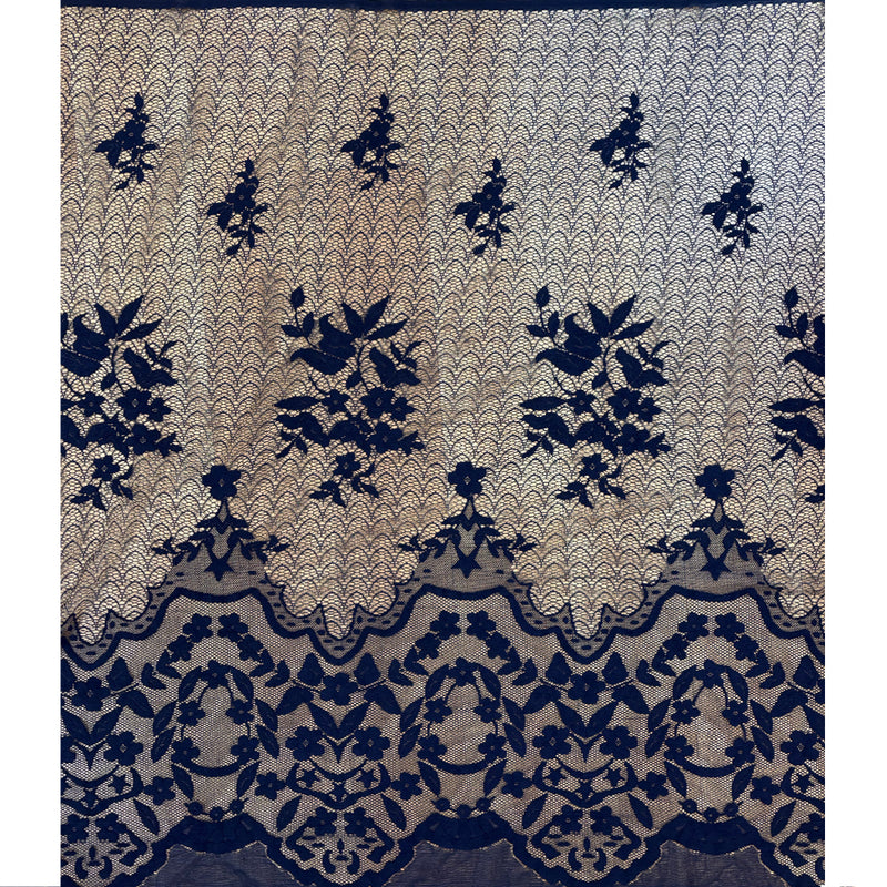 Dentelle polyester brodée sur résille bleu marine
