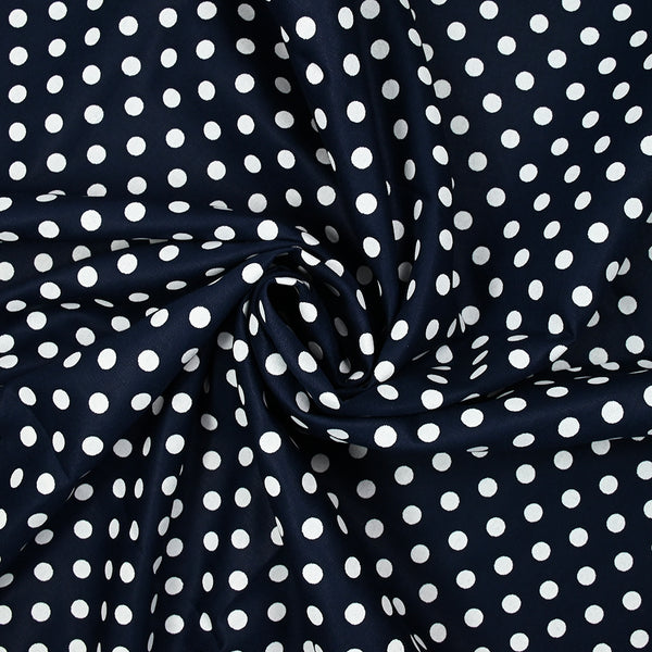 Coton imprimé pois 8mm fond bleu marine