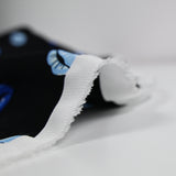 Crêpe viscose satiné bouche bleue fond noir