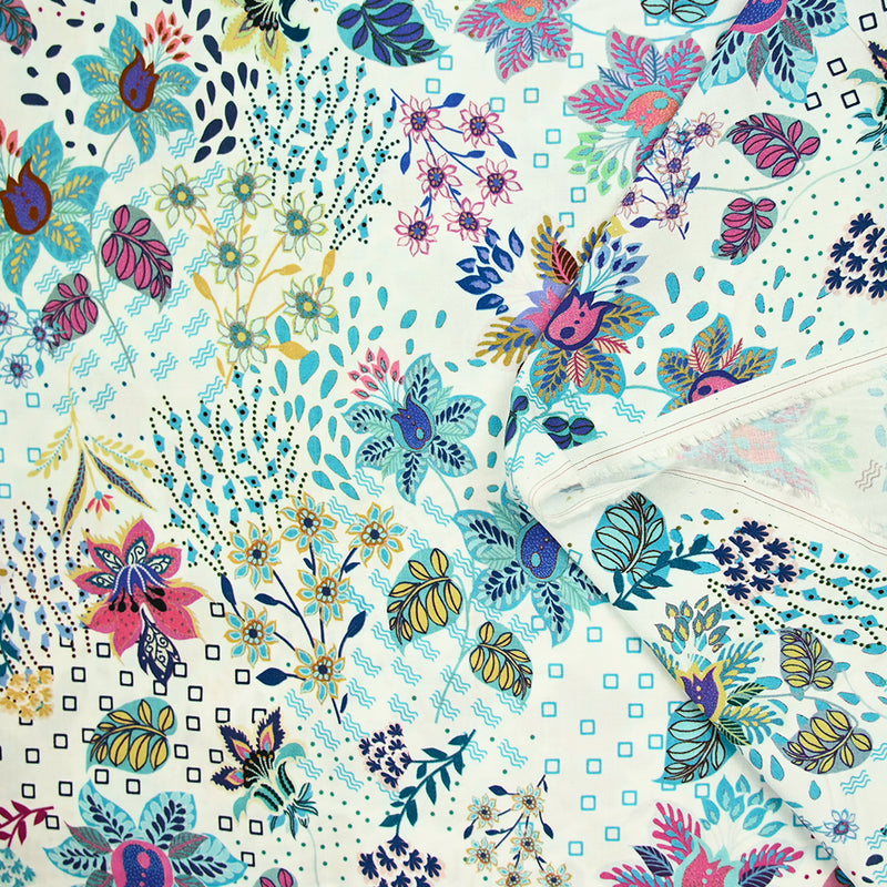 Viscose imprimée explosion florale turquoise fond blanc