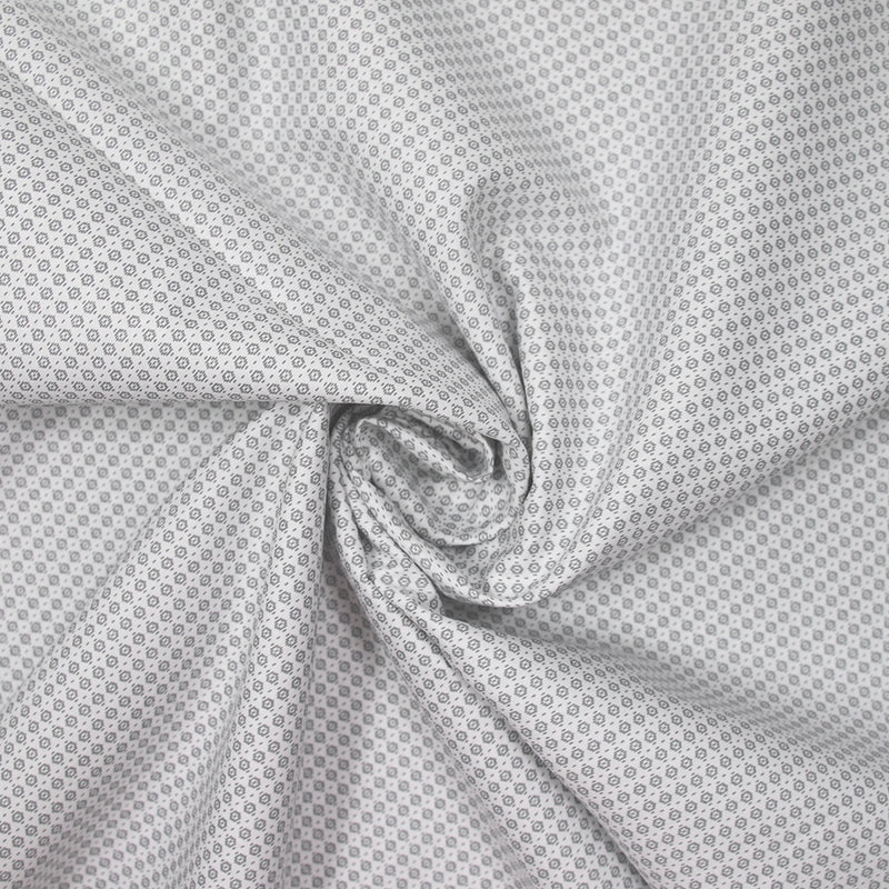 Coton imprimé brique grise fond blanc cassé