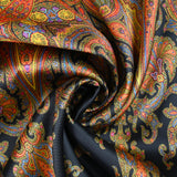 Sergé de polyester satiné motif cachemire fond bleu nuit