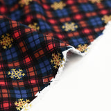 Flanelle de coton imprimée tartan marron et flocons dorés