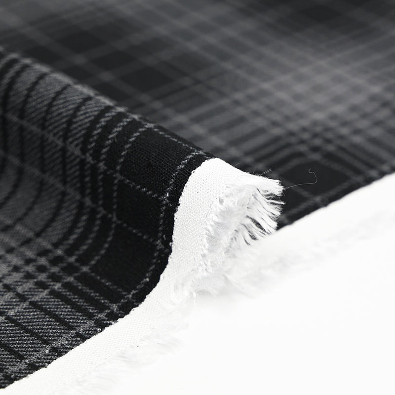 Viscose imprimée carreaux gris fond noir