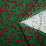 Flanelle de coton imprimée cerfs tartan rouge fond vert gazon