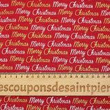 Popelina de algodón estampada con Feliz Navidad en dorado y plateado sobre fondo rojo