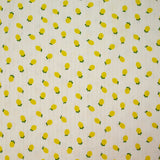 Jersey pointelle coton imprimé citron fond blanc cassé