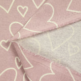 Flanelle imprimée cœurs fond mauve