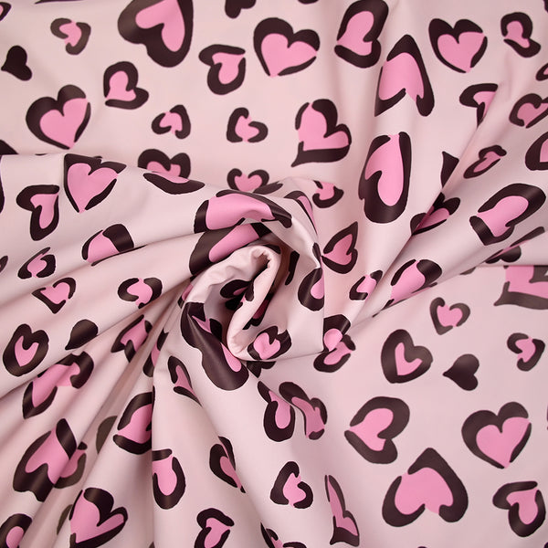 Tissu imperméable déperlant imprimé petit coeur rose