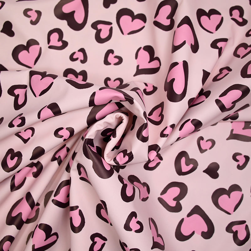 Tissu imperméable déperlant imprimé petit coeur rose