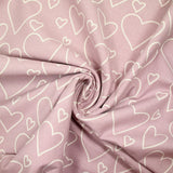 Flanelle imprimée cœurs fond mauve