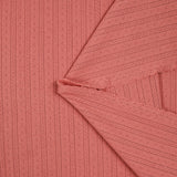 Jersey pointelle 100% coton corail