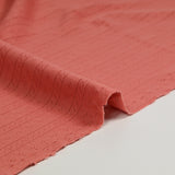 Jersey pointelle 100% coton corail