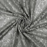 Dentelle polyester Victoria argent fond gris