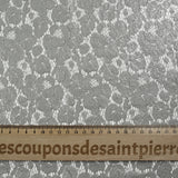 Dentelle polyester Victoria argent fond gris