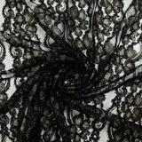 Dentelle polyester à bandes florales or brodées lurex noir
