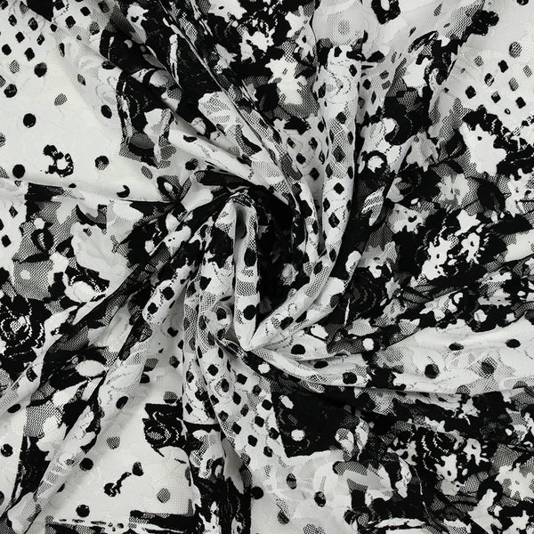 Dentelle polyester imprimée fantaisie noir sur fond blanc